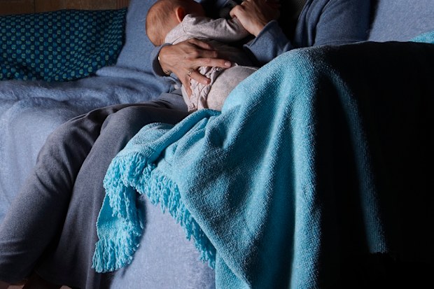 Tired mother with child.