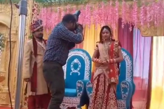 Groom responds after wedding photographer takes photos of bride