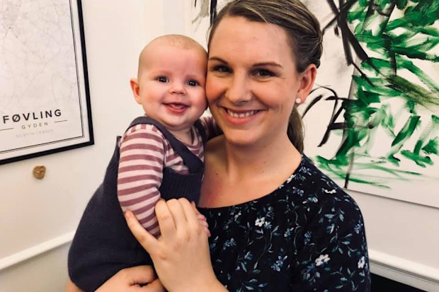 Danish MP told to remove baby from parliament chamber