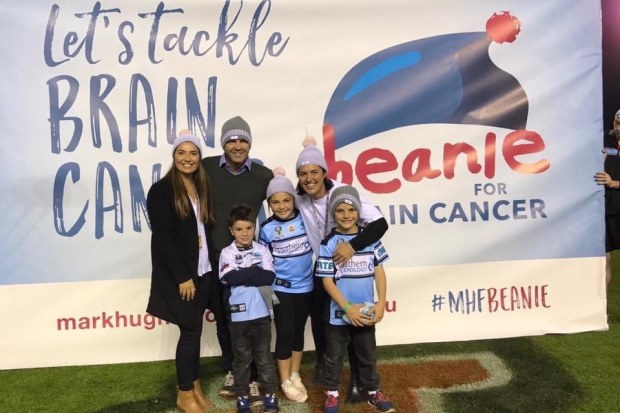 Maddy Callander (left) and family at the first Beanie for Brain Cancer game.
