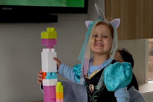 The little girl asks her mum why she is the only one in the family who is sick.