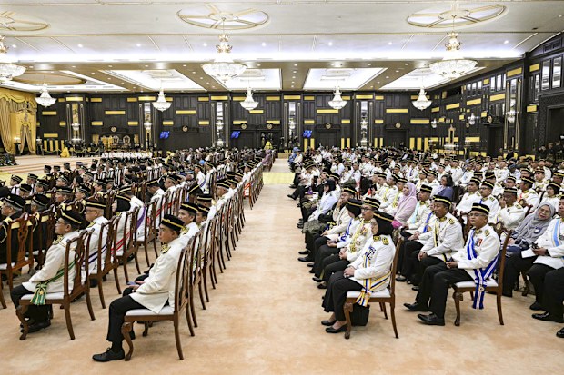 Officials sit during the oath taking ceremony of the 17th King of Malaysia at the National Palace in Kuala Lumpur, Malaysia, Wednesday, Jan. 31, 2024. 