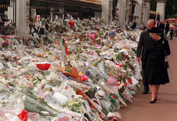 The Queen and Duke of Edinburgh view the floral tributes to Diana, Princess of Wales at Buckingham Palace on Friday September 5, 1997. Photo by John Stillwell.