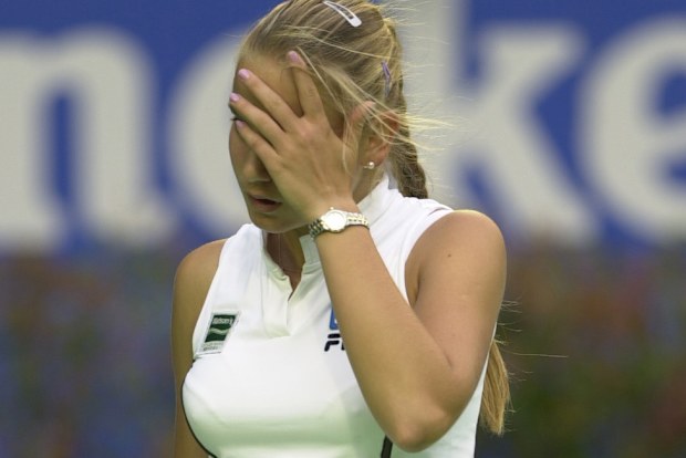 Jelena Dokic of Yugoslavia puts her hand to her face in her match against Lindsay Davenport of the USA, in the first round of the Australian Open Tennis Championships, played at Melbourne Park in Melbourne, Australia. 