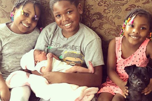 The children with their new sibling.