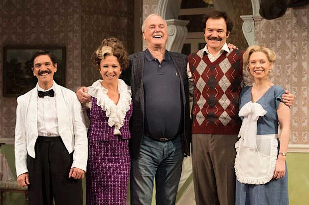 John Cleese (centre) who wrote the original BBC comedy series of Fawlty Towers with actors (from left to right) Syd Brisbane who plays Manuel, Blazey Best who plays Sybil, Stephen Hall who plays Basil and Aimee Horne who plays Polly.