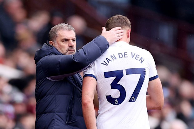 Ange Postecoglou consoles Micky van de Ven after he leaves the pitch due to injury.