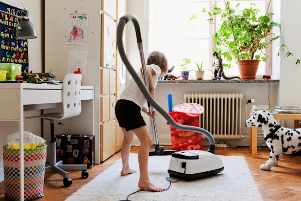 Boy vacuuming