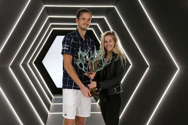 PARIS, FRANCE - NOVEMBER 8: Winner Daniil Medvedev of Russia and his wife Daria Medvedeva pose with the trophy following Daniil's victory over Alexander Zverev of Germany in the men's final on day 7 of the Rolex Paris Masters, an ATP Masters 1000 tournament held behind closed doors at AccorHotels Arena formerly known as Paris Bercy on November 8, 2020 in Paris, France. (Photo by Jean Catuffe/Getty Images)