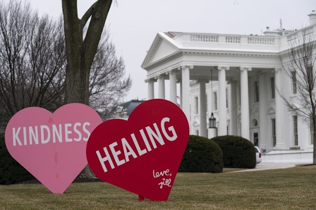 A Valentine's Day decoration, signed by first lady Jill Biden, sits on the North Lawn of the White House.