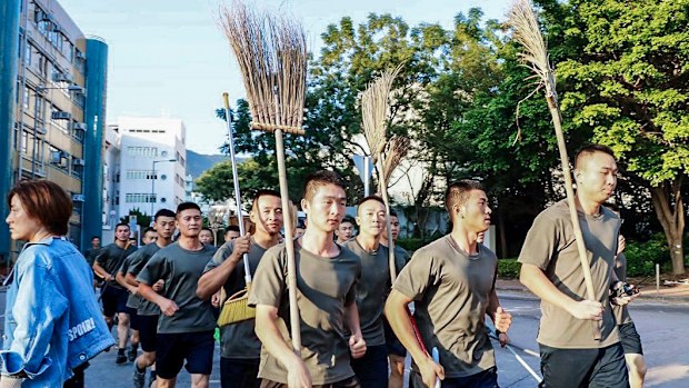 Hong Kong on edge after PLA road-clearing exercise