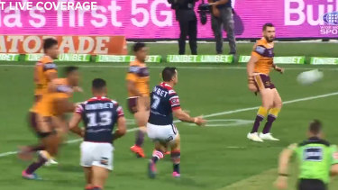 'Dog shot': Tevita Pangai Jnr races up to hit Cooper Cronk late on Thursday night.