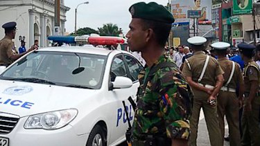 Sri Lankan soldiers secure the area around St Anthony's Shrine in Colombo. Witnesses are reporting many dead in the attacks targeting worshippers at Easter services. across the country 