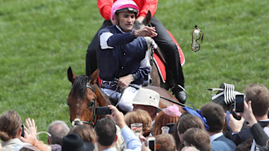 Corey Brown was so pumped after the win he threw his race goggles into the crowd. The Jockey was met by his wife and three daughters after the race and was overcome by emotion.