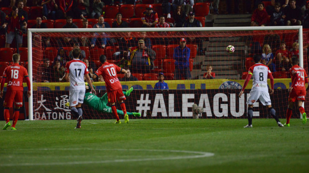 Marcelo Carrusca scores from the penalty spot for Adelaide United. (AAP)