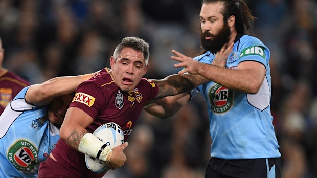Woods (right) says his long-time Origin rival deserves an international farewell. (AAP)