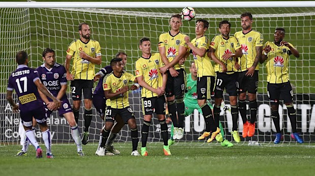 Diego Castro launches a free-kick over the Wellington wall. (AAP)