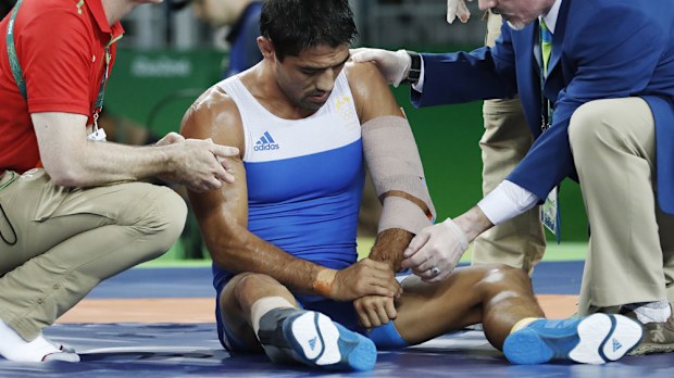 Talgat Ilyasov receives medical treatment. (AFP)