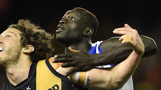 Majak Daw will be retained through the AFL rookie draft. (AAP)
