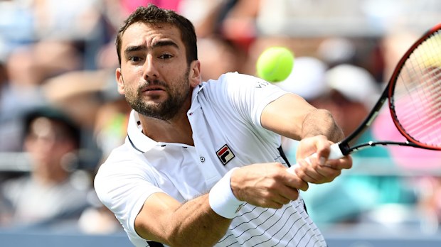 Former champion Marin Cilic has lost in straight sets to Jack Sock. (AFP)