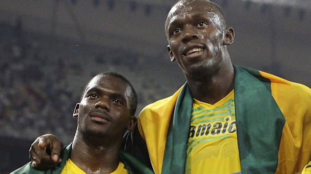 Nesta Carter and Usain Bolt. (AAP)