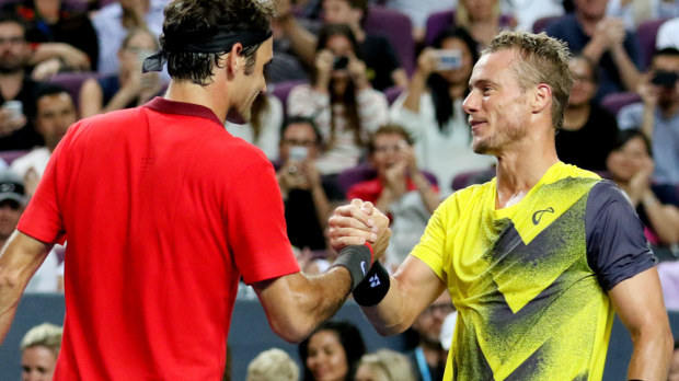 Roger Federer (L) and Lleyton Hewitt. (Getty-file)