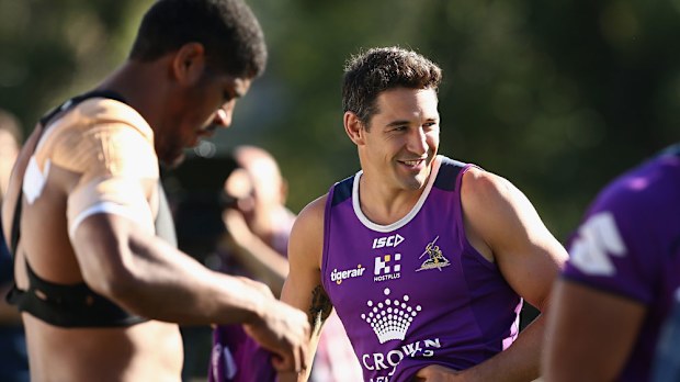 Melbourne fullback Billy Slater (r).