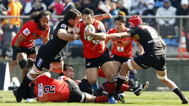 A Sunwolves player cuts through the Lions' defence. (AAP)