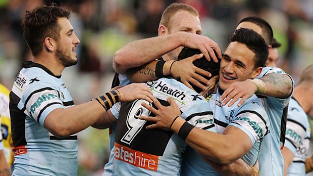 Cronulla players celebrate a try in 2015. (AAP)