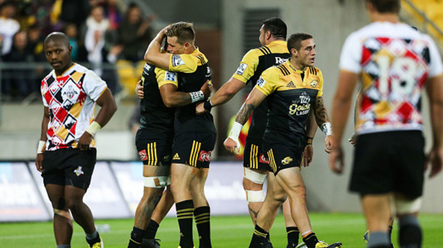 Hurricanes players celebrate victory over the Kings. (Getty)