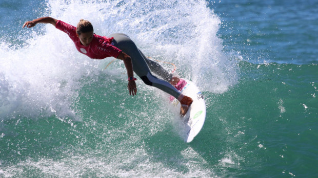 Sally Fitzgibbons made a bright start to her own surfing event. (AAP)