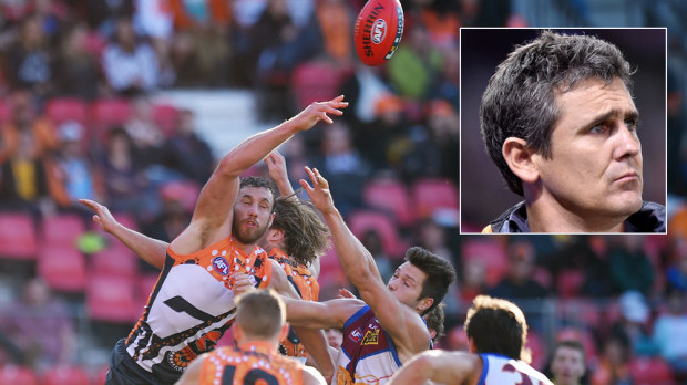 Shane Mumford rises above the pack and (inset) Giants coach Leon Cameron. (AAP)