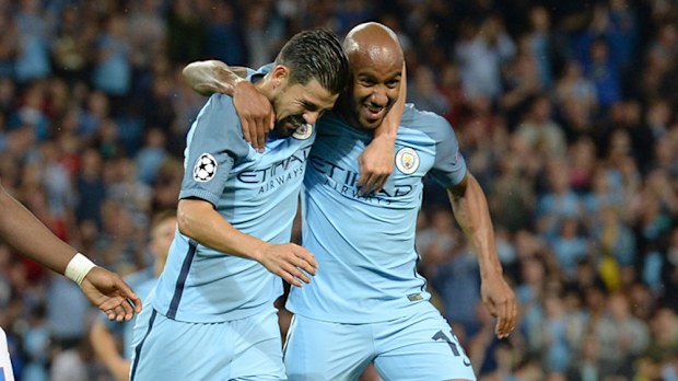 Manchester City players celebrate after scoring against Steaua Bucharest. (Getty)