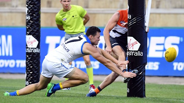 Giants forward Steve Johnson scores a cheeky goal against the Suns. (AAP)