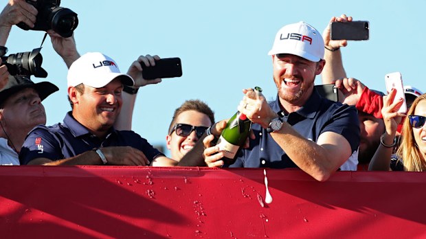 Patrick Reed (left) and Jimmy Walker celebrate the historic win. (AAP)