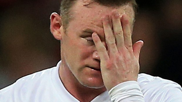 Wayne Rooney has apologised for 'inappropriate' images. (AAP)