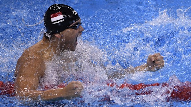 Joseph Schooling celebrates his 100m butterfly final. (AFP)