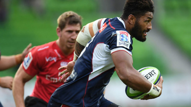 Amanaki Mafi take the ball ahead for the Rebels. (AAP)