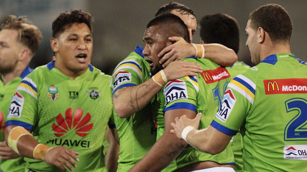 Junior Paulo (second from right) gets congratulated by his Raiders teammates. (Getty)