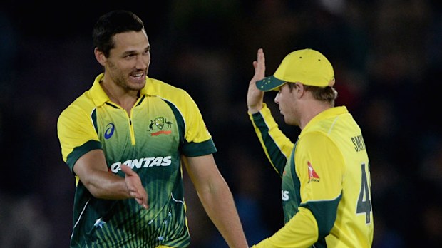Nathan Coulter-Nile celebrates a wicket with Steve Smith. (Getty)