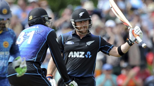 Brendon McCullum celebrates his half-ton. (AAP)