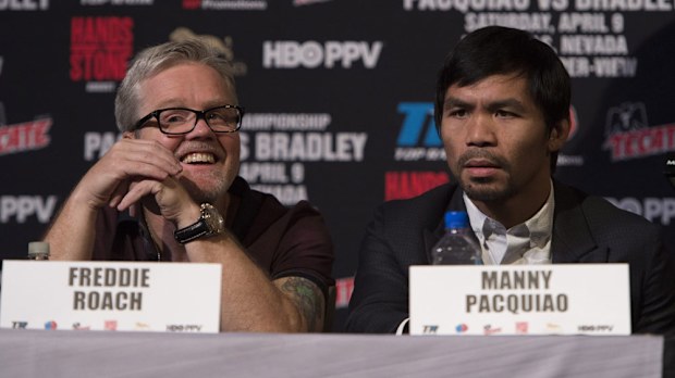 Many Pacquiao and his trainer Freddie Roach. (AAP)