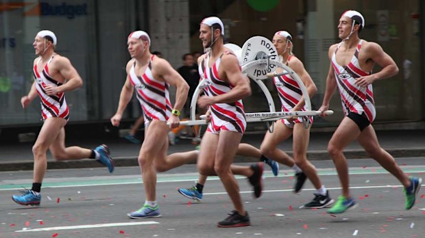 Runners take part in the 2014 City 2 Surf road race