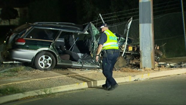 The car collided with the pole on Ackland Street. (9NEWS)