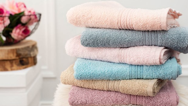 Stack of folded towels in bathroom