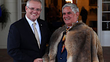 Member for Hasluck and Minister for Indigenous Australians Ken Wyatt (right) poses for a photograph with Australian Prime Minister Scott Morrison (left) after the Coalition swearing in  at Government House in Canberra, Wednesday, 29 May 2019. The 46th parliament is expected to open in the first week of July, 2019. (AAP Image/Lukas Coch) NO ARCHIVING