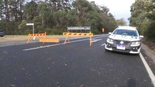 Police at the scene of the fatal crash near Orbost this afternoon.