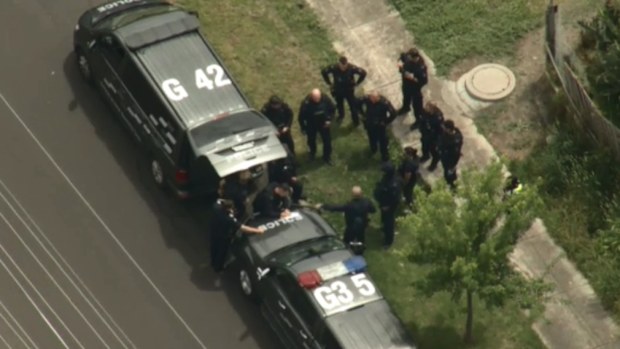 Multiple CIRT officers swarmed the home in Reservoir this afternoon.