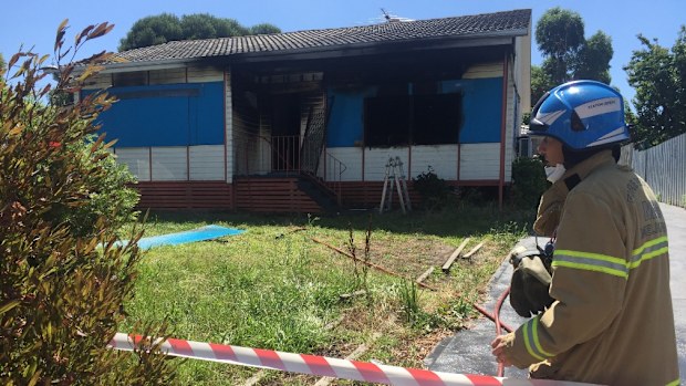The home has sustained significant damage to its exterior.