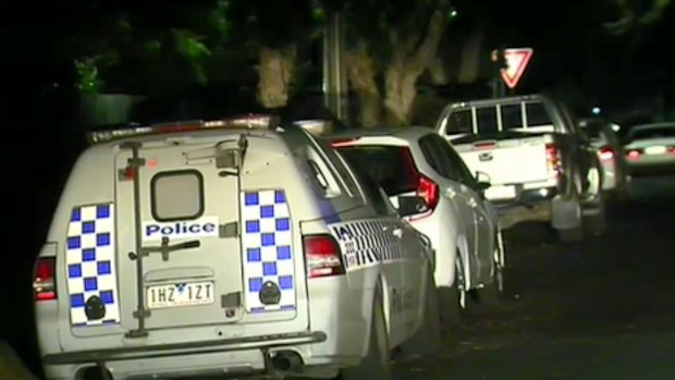 Police blocked off the street after the shooting. (9NEWS)